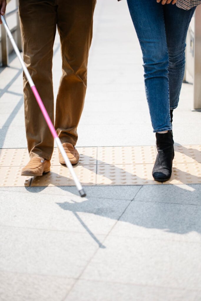 photo of people walking on pavement